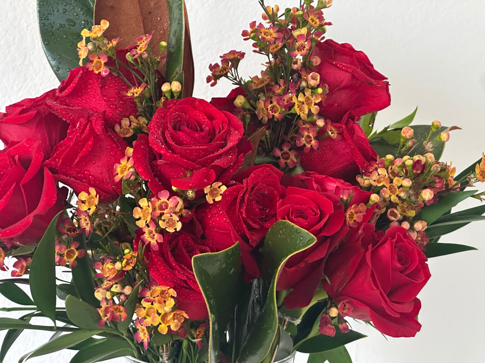 Fall Magnolia leaf and red roses