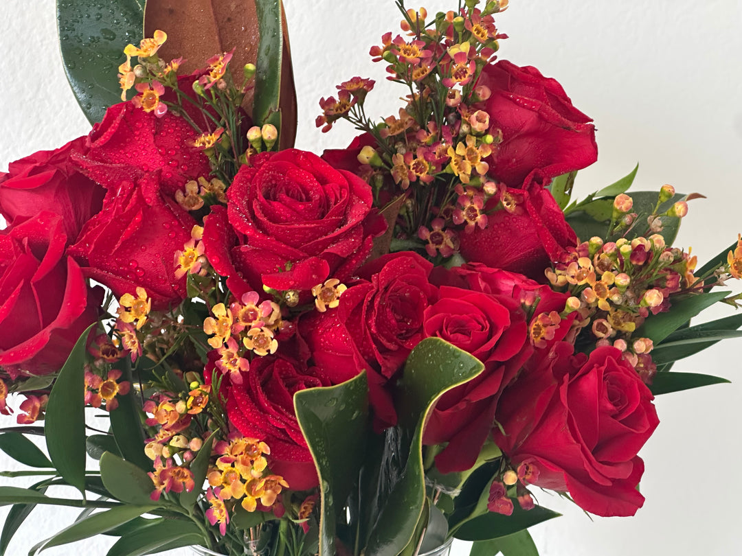Fall Magnolia leaf and red roses
