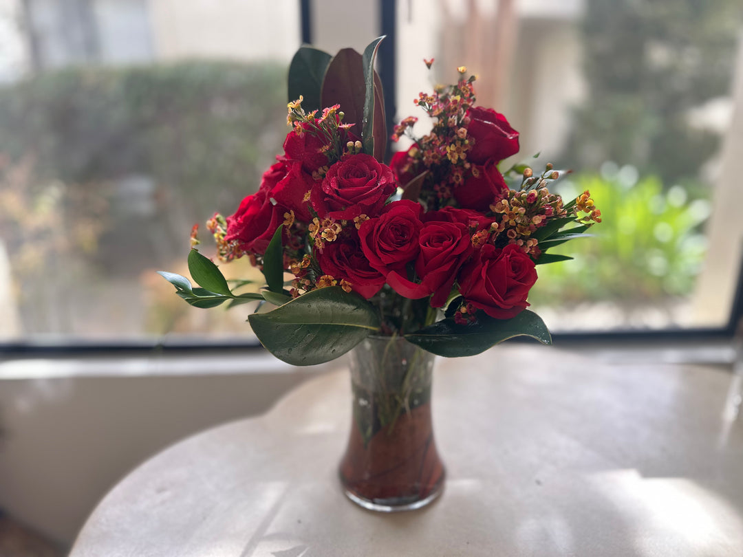 Fall Magnolia leaf and red roses