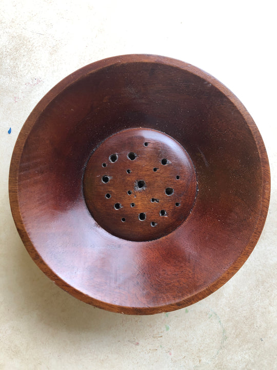 Ivory dried flower arrangement in wood bowl
