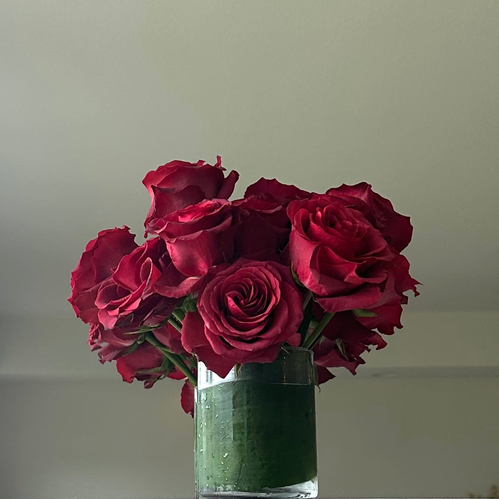 Red ombré roses in clear glass