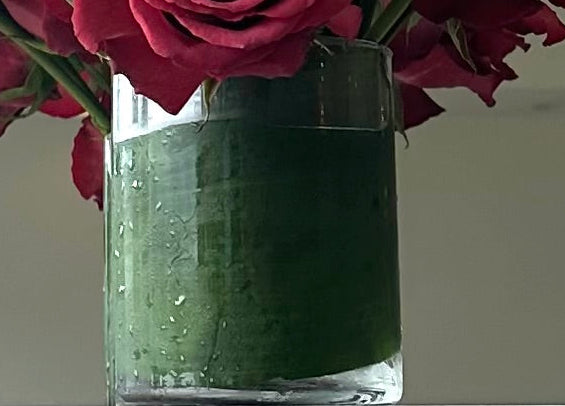 Red ombré roses in clear glass