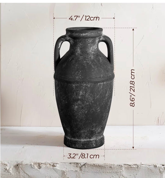 Black ceramic vase with dimensions on a light gray background