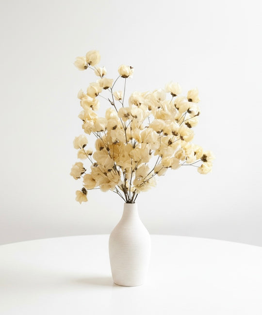 Ivory dried flower arrangement in vase
