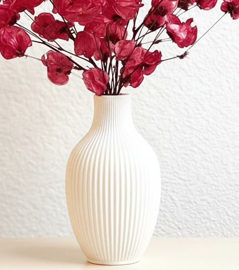 Red dried flower arrangement in vase