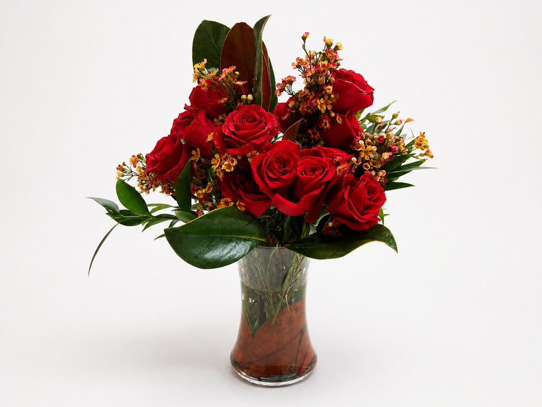 Fall Magnolia leaf and red roses