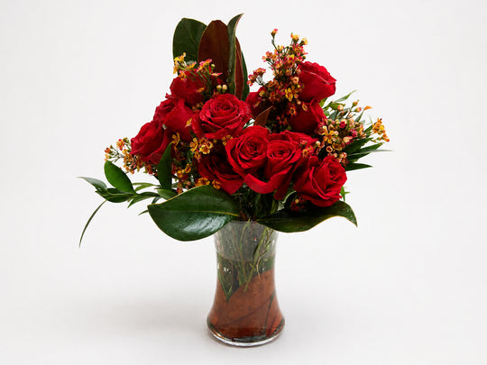 Fall Magnolia leaf and red roses
