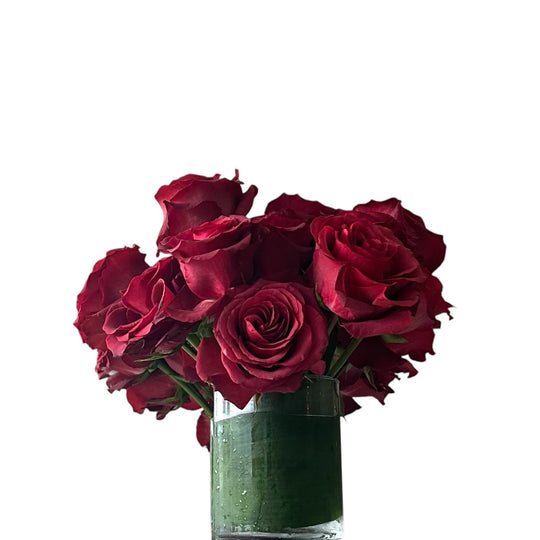 Red ombré roses in clear glass