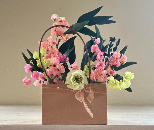 Carton of Eden dried and preserved flower arrangement in craft tote